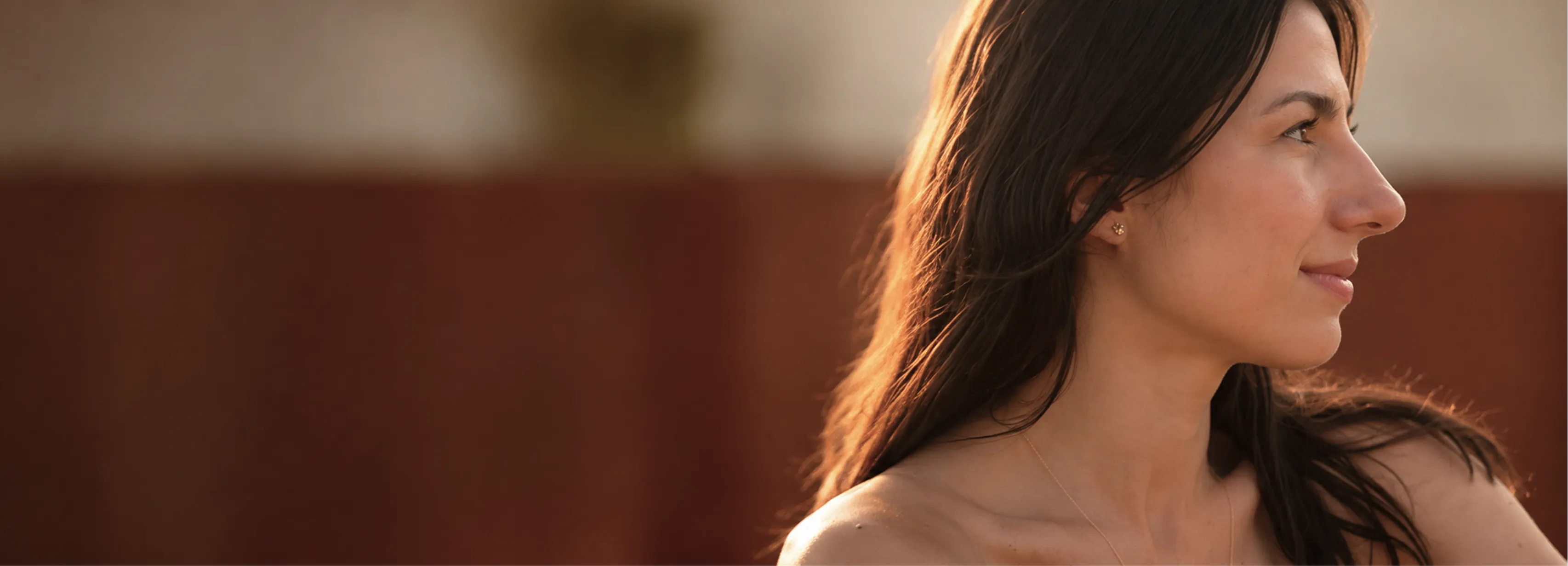 Portrait of Monica M., a certified yoga instructor and studio founder.